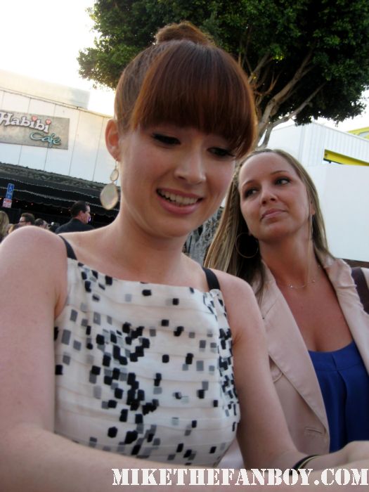 ellie kemper from The Office and becca from Bridesmaids signs autographs for fans at the bridesmaids movie premiere in westwood! sexy hot rare funny quotes promo press kit one sheet movie poster movie quotes rare