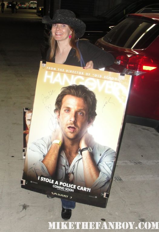 Annette proudly displaying her hand signed hangover promo one sheet movie teaser poster signed autographed by bradley cooper mike the fanboy sexy hot cowboy