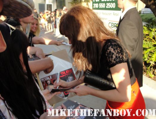 actress Fiona Dourif  signing autographs for fans at the true blood season 4 world premiere red carpet rare promo poster true colors premiere rare fangtasia promo sign autographs