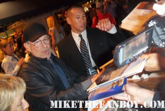 steven spielberg director of E.T. Jurassic Park hook signing autographs for fans at the super 8 movie premiere in westwood ca director indiana jones rare promo