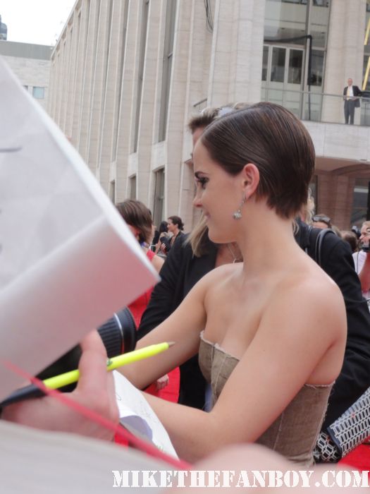 emma watson signing autographs at the the harry potter and the deathly hallows part 2 new york movie premiere waiting fans for the red carpet daniel radcliffe