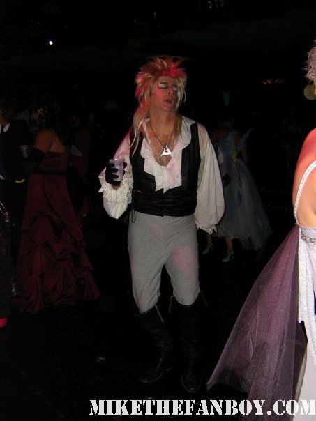 man dressed like Jareth at the 14th Annual Labyrinth of Jareth Masquerade the novel strumpet dressed up in dress and corset