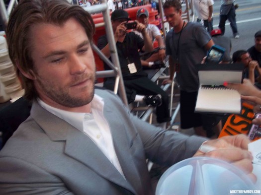 Picture The world movie premiere of Captain America the First Avenger at the el capitan theatre in hollywood chris hemsworth signing autographs for fans hot sexy photo shoot rare thor signed autograph hot sexy rare shirtless promo damn fine
