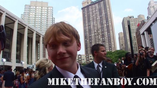 Rupert Grint signing autographs for fans at the the harry potter and the deathly hallows part 2 new york movie premiere waiting fans for the red carpet daniel radcliffe sexy rare