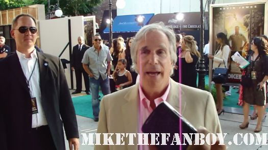 Leah Remini from King of queens and living dolls  and henry winkler from happy days stops to sign autographs for fans at the zookeeper world movie premiere in westwood rare 