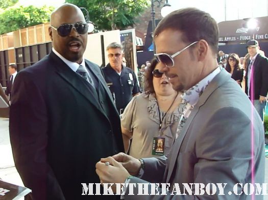 new kids on the block member donnie wahlberg stops to sign autographs for fans at the zookeeper premiere in westwood sexy hot shirtless sexy photoshoot promo rare marky mark hot rare muscle reunion 