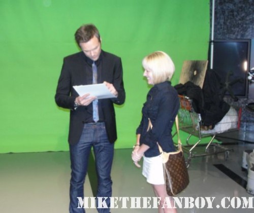 On the set of the soup with joel mchale! Lindsay getting her photo autographed by joel mchale community rare promo green screen