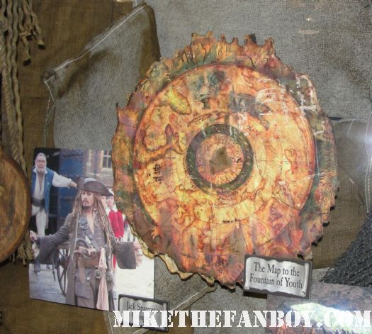 D23 2011 walt disney pirates of the caribbean on stranger tides props and costumes rare johnny depp jack sparrow penelope cruz sword costume compass Penelope Cruz's  costume and gun from Pirates Caribbean anjelica the fountain of youth treasure map