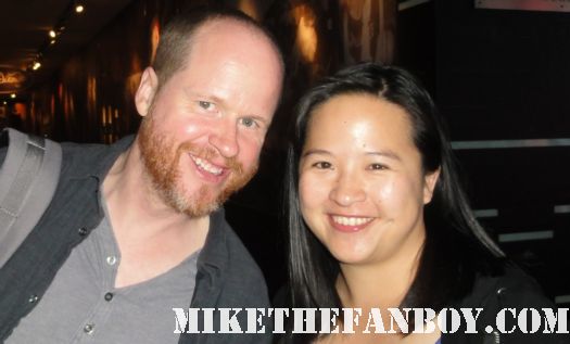 buffy the fampire slayer creator joss whedon dollhouse firefly serenity posing for a fan photo with mike the fanboy writer erica