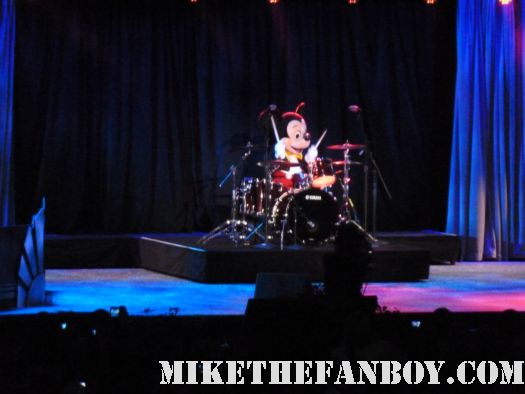 Micky Mouse  Drumming at the Vinylmation signed autograph mickey mouse toys at the d23 expo anaheim ca angelina jole johnny depp brad pitt expo the d23 expo 2011 the annual disney fan event held in anaheim ca rare promo mickey mouse rare  walt disney parks and resorts panel d23