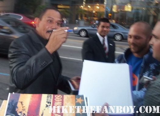 kim coates signs autographs for fans at the sons of anarchy season 4 world premiere with katey sagal Emilio Rivera Theo Rossi CHARLIE HUNNAM charlie hunnam hot and sexy looking sexy signing autographs for fans sexy shirtless rare hot charlie hunnam sons of anarchy signed autograph promo poster rare