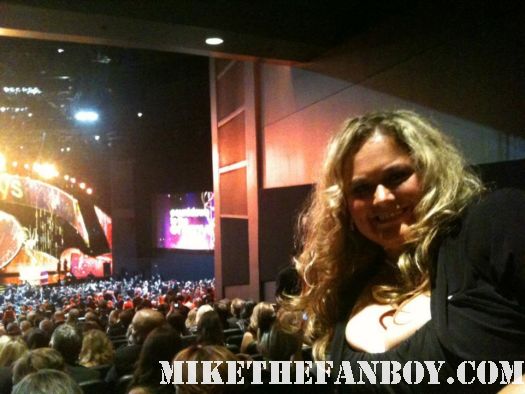 mike the fanboy's pretty in pinky at the 2011 emmy awards holding an emmy statue in the foyer