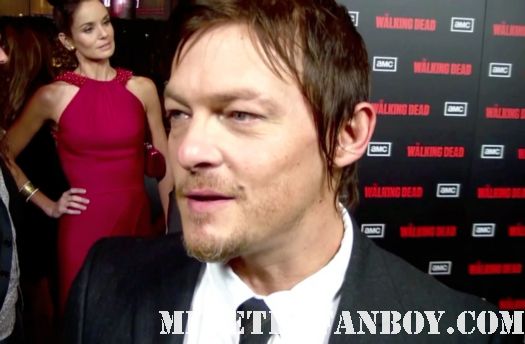 norman reedus on the red carpet at the walking dead season 2 world premiere in los angeles