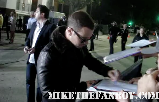 joey lawrence signing autographs for fans at the in time world movie premiere the crowd at the in time world movie premiere anushika stealing cbs pen the crowd at the in time world movie premiere in time car prop in time world movie premiere red carpet with justin timblerlake, amanda seyfried matt bomer johnny galecki hot sexy rare promo