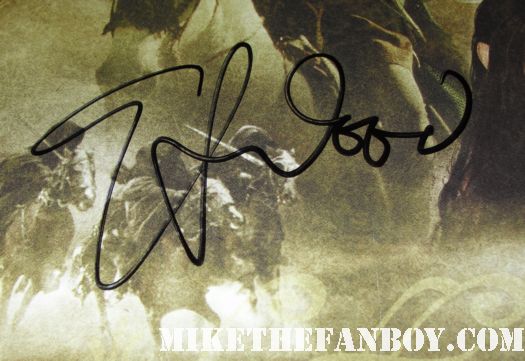 elijah wood signed autograph lord of the rings poster elijah wood signing autographs at The Happy Feet Two World Movie Premiere! Pink... Or P!NK ! Robin Williams! Sofia Vergara! Hank Azaria! Elijah Wood!