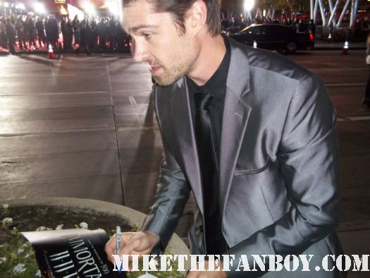 corey servier sexy hot rare signing autographs at the immortals world movie premiere The Immortals World Movie Premiere red carpet! With Henry Cavill! Luke Evans! Stephen Dorff! Kellan Lutz! Mickey Rourke! Cory Servier! Isabel Lucas! Autographs! Photos and More! 