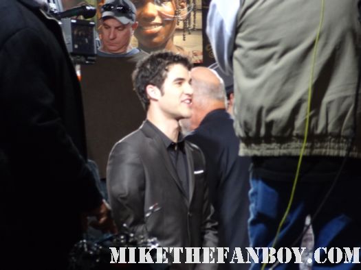 glee star darren criss arrives the new years eve world movie premiere and signs autographs for fans