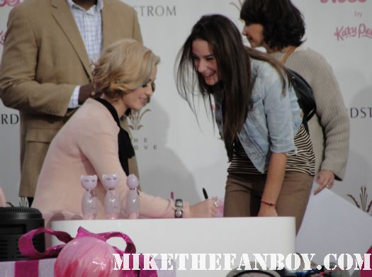katy perry taping extra with mario lopez katy perry doing a q and a press conference katy perry autograph signing sign at the grove katy perry laminate for meow perfume autograph signing at the grove nordstroms rare promo