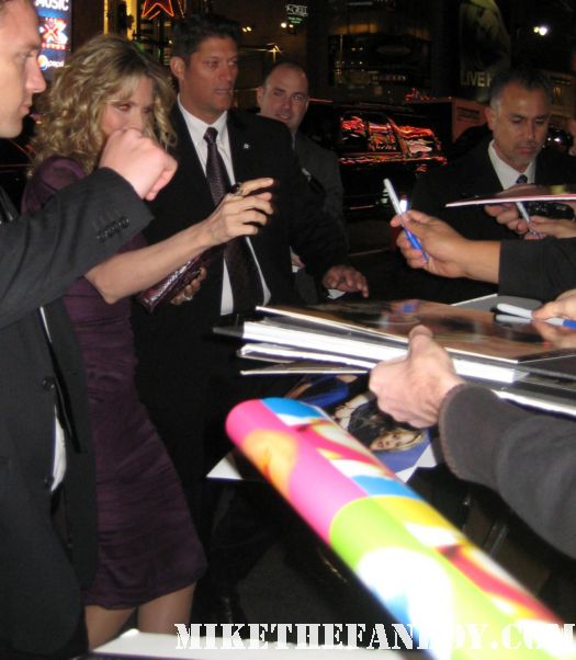 Michelle Pfeiffer arrives the new years eve world movie premiere and signs autographs for fans