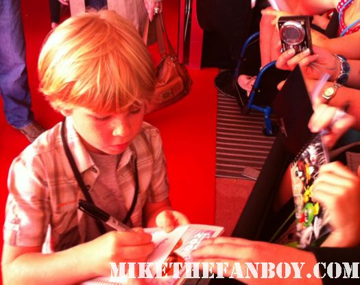 Bindi Irwin and robert irwin sign autographs at the puss in boots australian movie premiere