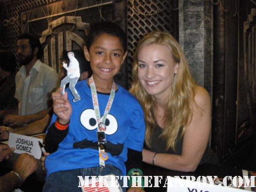 Yvonne Strahovski from the cast of chuck signs autographs for fans and poses for photos at san diego comic con 2010 sdcc 2010 signed autographs rare promo