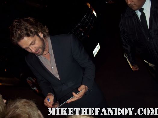 the hot and sexy 300 star Mr. Gerard butler stops to sign autographs for fans after taping the tonight show with jay leno