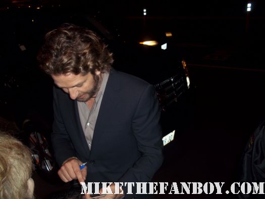 the hot and sexy 300 star Mr. Gerard butler stops to sign autographs for fans after taping the tonight show with jay leno
