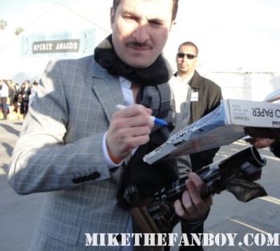 sexy and hot black swan director Darren Aronofsky signing autographs for fans at the 2011 Independent Spirit Awards 2011