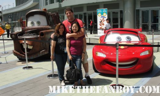 mike the fanboy with the lovely erica and suddenly susan at the D23 expo in anaheim posing with cars 2 lightning mcqueen and mater