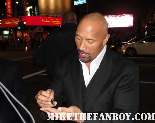 dwayne the rock johnson signing autographs for fans at the journey 2 world movie premiere hot sexy rare promo signed mini poster promo the tooth fairy