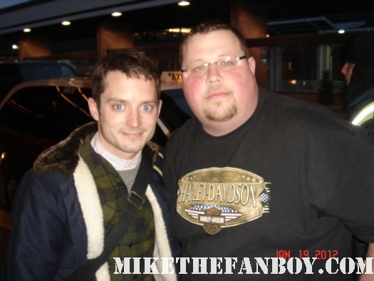 Chuck our man in texas poses with elijah wood from lord of the rings and the faculty wilfred  at sundance 2012 autographs signed 