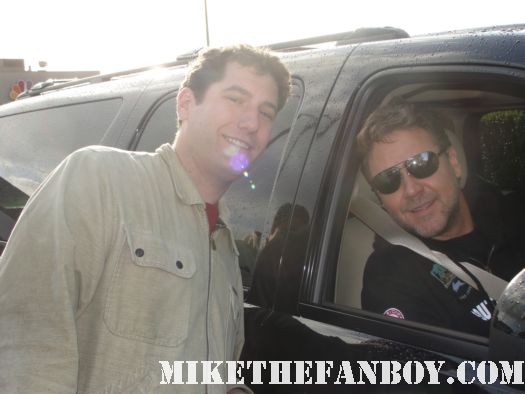 mike the fanboy posing with gladiator star russell crowe after he signs autographs for fans from his car