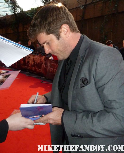 Jonathan Liebesman signing autographs at the red carpet of the wrath of the titans world movie premiere rare promo director of wrath of the titans