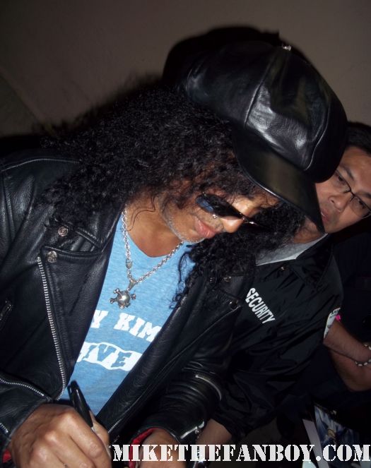 Guns n roses star and lengend slash signs autographs for fans after an outdoor concert rare promo hot musician