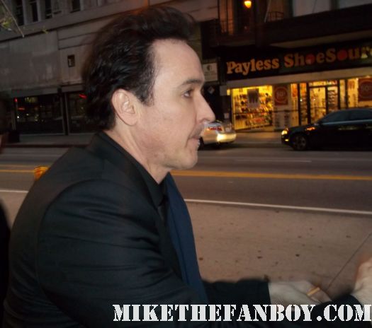 john cusack signing autographs for fans at the world premiere of the raven in los angeles sexy john cusak hot tub time machine