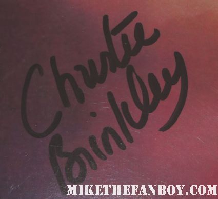 christie brinkley signing autographs signed autograph rare promo national lampoon's vacation promo movie poster chevy chase signature