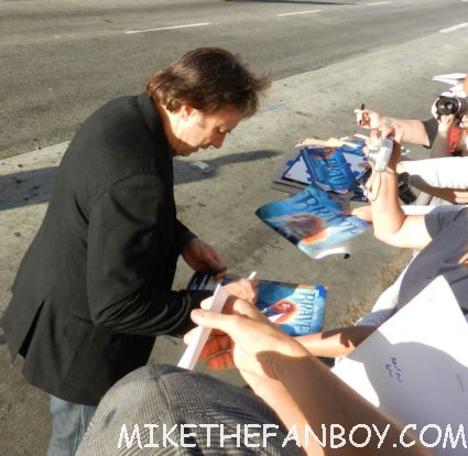 weeds star kevin nealon signing autographs for fans at the world premiere of brave in hollywoodbag pipe players at walt disney's world premiere of brave pixar rare red carpet scottish animated classic  