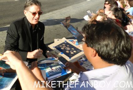 craig ferguson signing autographs for fans at the world premiere of brave in hollywoodbag pipe players at walt disney's world premiere of brave pixar rare red carpet scottish animated classic  