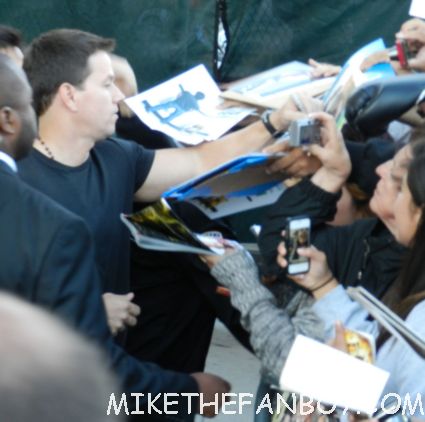marky mark wahlberg signing autographs for fans after a talk show taping promoting ted with mila kunis