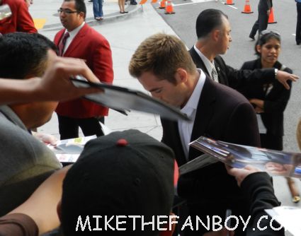 sexy chris pine signing autographs at  the world premiere of people like us world movie premiere at the la film festival in downtown los angeles michelle pfeiffer chris pine elizabeth banks
