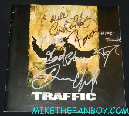 Benicio Del Toro dennis quaid topher grace catherine zeta jones don cheadle signed traffic program signing autographs for fans at the savages world movie premiere hot sexy traffic star