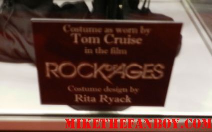 tom cruise's black cowboy hot and leopard print vest shirtless costume and prop display as stacey jaxx from rock of ages cosplay