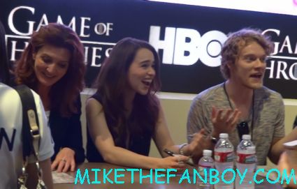 game of thrones cast autograph signing at the warner bros booth Emilia Clarke and alfie signing autographs at the warner bros booth at comic con 2012 sdcc 2012 game of thrones cast signing