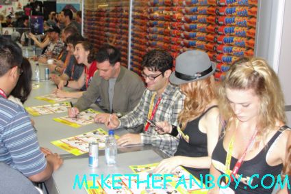 the cast of bob's burgers signing autographs at the fox booth at san diego comic con 2012 sdcc