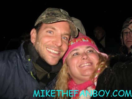 pretty in pinky from mike the fanboy posing with bradley cooper looking sexy for a fan photo