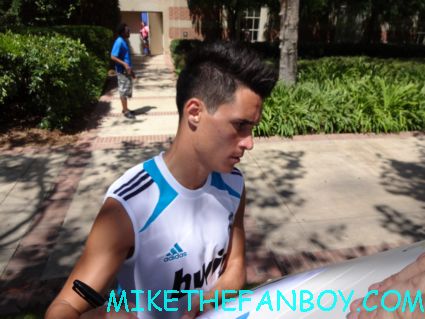 Jose Maria Callejon from the real madrid soccer team looking hot and sexy signs autographs for fans