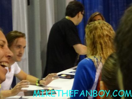 the crowd of people for tom felton at sherlyn fenn and  Sheryl lee signing autographs twin peaks japanese program  at sexy jon berthanal signing autographs at wizard world chicago 2012 opening gates sign logo rare promo with norman reedus sheryl lee rare autograph signed hot