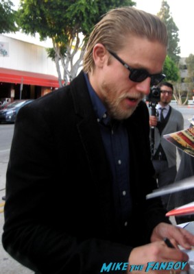 sexy charlie hunnam signs autographs for fans at the sons of anarchy world premiere in westwood rare promo