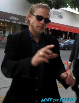 sexy charlie hunnam signs autographs for fans at the sons of anarchy world premiere in westwood rare promo