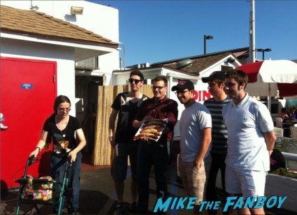 The cast of the uk hit film the inbetweeners at pink's hot dogs in los angeles Simon Bird, James Buckley, Blake Harrison and Joe Thomas